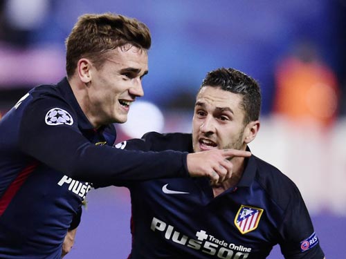 Antoine Griezmann (trái) góp công lớn trong chiến thắng của Atletico Madrid