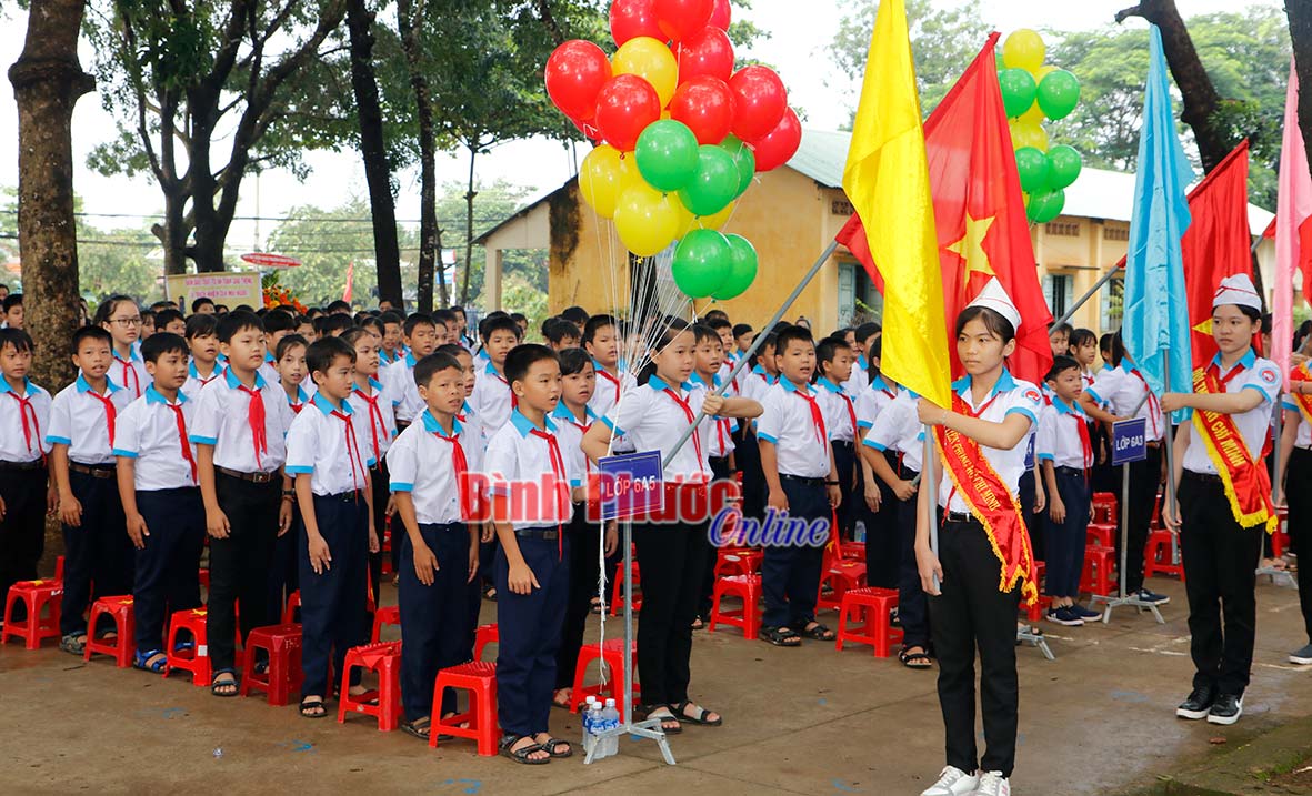 Học sinh Trường THCS Tiến Thành (Đồng Xoài) trong lễ khai giảng năm học 2018-2019 (ảnh minh họa) - B.L